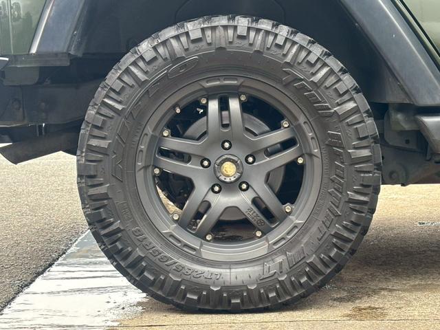 ジープ・ラングラーアンリミテッド スポーツ　Ｊｅｅｐ『ラングラーアンリミテッド　サハラ』車検令和８年７月／ＳＤナビ／Ｂｌｕｅｔｏｏｔｈ／フルセグＴＶ／サイドモニター／クルーズコントロール／１８インチアルミ／ＥＴＣ／パートタイム４ＷＤ（24枚目）