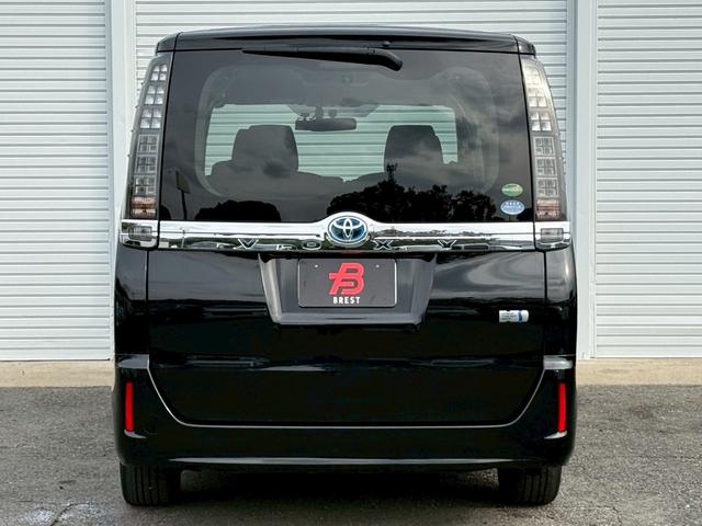 ヴォクシー ハイブリッドV 純正9インチデカナビ/Bluetooth/フルセグTV/バックモニター/ALPINEフリップダウンモニター/両側電動スライドドア/ドラレコ/シートヒーター/置くだけ充電/LEDヘッドライト/ETC(4枚目)