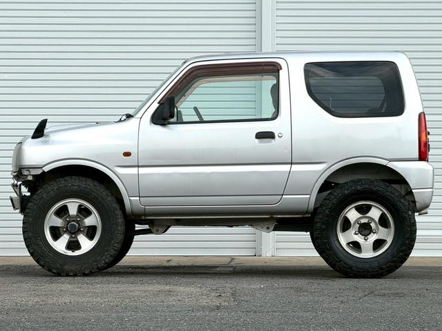 ジムニー ＸＧ　ＡＴ車／４ＷＤ／２－３インチリフトＵＰ／社外１６インチアルミ／車検令和８年１１月／パワステ／パワーウィンドウ／エアコン／保証書（3枚目）