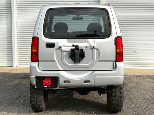ジムニー ＸＧ　ＡＴ車／４ＷＤ／２－３インチリフトＵＰ／社外１６インチアルミ／車検令和８年１１月／パワステ／パワーウィンドウ／エアコン／保証書（4枚目）