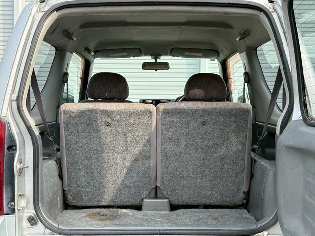 ジムニー ＸＧ　ＡＴ車／４ＷＤ／２－３インチリフトＵＰ／社外１６インチアルミ／車検令和８年１１月／パワステ／パワーウィンドウ／エアコン／保証書（9枚目）