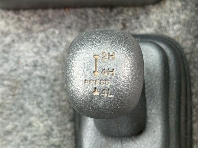 ジムニー ＸＧ　ＡＴ車／４ＷＤ／２－３インチリフトＵＰ／社外１６インチアルミ／車検令和８年１１月／パワステ／パワーウィンドウ／エアコン／保証書（14枚目）