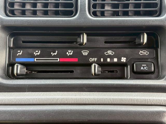 ジムニー ＸＧ　ＡＴ車／４ＷＤ／２－３インチリフトＵＰ／社外１６インチアルミ／車検令和８年１１月／パワステ／パワーウィンドウ／エアコン／保証書（17枚目）