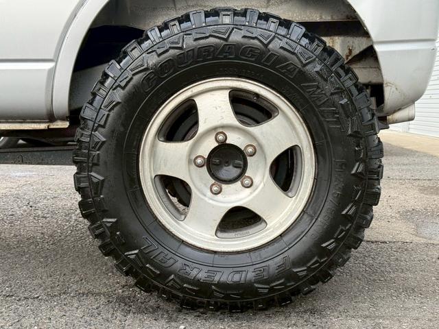 ジムニー ＸＧ　ＡＴ車／４ＷＤ／２－３インチリフトＵＰ／社外１６インチアルミ／車検令和８年１１月／パワステ／パワーウィンドウ／エアコン／保証書（20枚目）