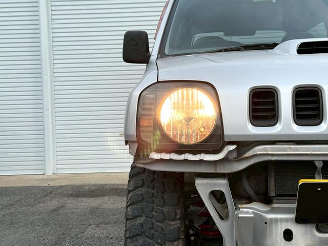 ジムニー ＸＧ　ＡＴ車／４ＷＤ／２－３インチリフトＵＰ／社外１６インチアルミ／車検令和８年１１月／パワステ／パワーウィンドウ／エアコン／保証書（21枚目）