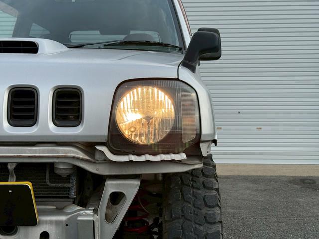 ジムニー ＸＧ　ＡＴ車／４ＷＤ／２－３インチリフトＵＰ／社外１６インチアルミ／車検令和８年１１月／パワステ／パワーウィンドウ／エアコン／保証書（22枚目）