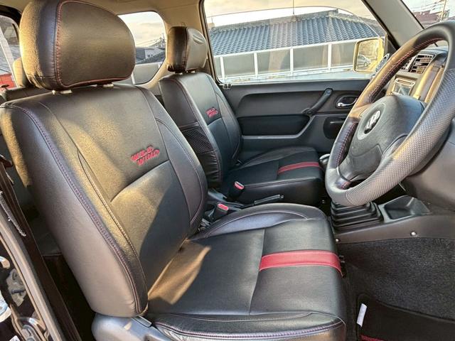 ジムニー ワイルドウインド　５速ＭＴ／パートタイム４ＷＤ／ルーフレール／背面タイヤ／シートヒーター／純正１６インチアルミ／ＣＤオーディオ／ミラーウィンカー／パワステ／パワーウィンドウ／エアコン／エアバック／革巻ステアリング（6枚目）