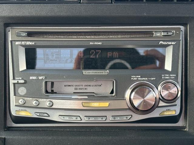 ジムニー ワイルドウインド　５速ＭＴ／パートタイム４ＷＤ／ルーフレール／背面タイヤ／シートヒーター／純正１６インチアルミ／ＣＤオーディオ／ミラーウィンカー／パワステ／パワーウィンドウ／エアコン／エアバック／革巻ステアリング（11枚目）