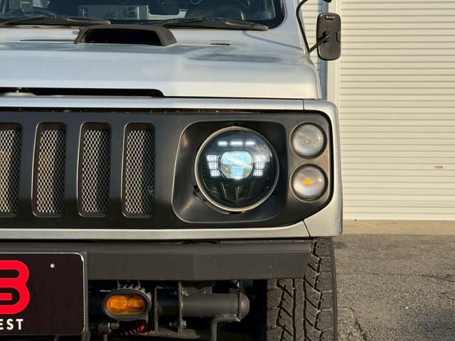 ジムニー ワイルドウインド　５速ＭＴ／パートタイム４ＷＤ／ＮＡＲＤＩ革巻ハンドル／ディスプレイオーディオ／Ｂｌｕｅｔｏｏｔｈ／ＣａｒＰｌａｙ／Ａｎｄｒｏｉｄ　Ａｕｔｏ　／バック・サイド・フロントモニター／ＪＡ２２Ｗ（25枚目）