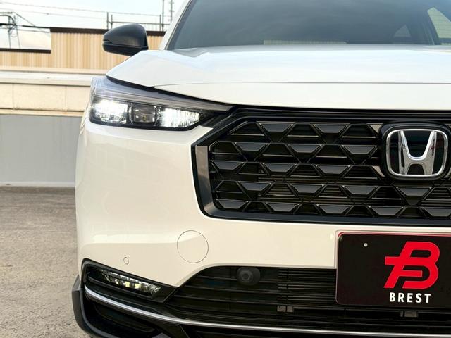 ヴェゼル ｅ：ＨＥＶ　ＲＳ　登録済未使用車　保証付　ＲＳ専用ローダウンサスペンション　ＲＳ専用エクステリア　ホンダコネクトディスプレー　ビルトインＥＴＣ２．０　ブラインドスポットモニター　半革シート　バックモニター　フルセグＴＶ（34枚目）