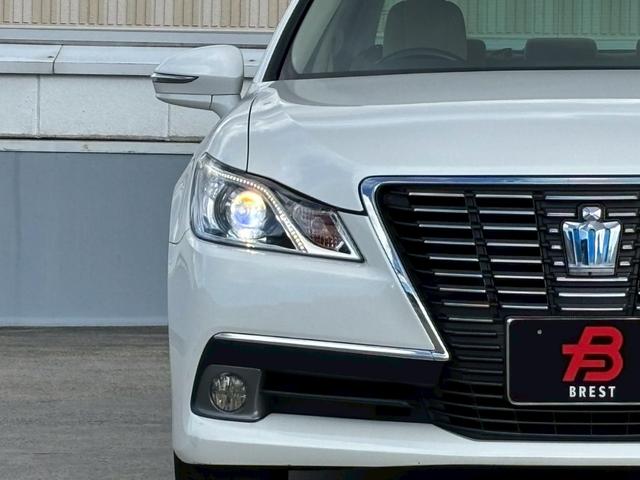 クラウンハイブリッド ロイヤルサルーン　メーカーナビ／Ｂｌｕｅｔｏｏｔｈ／フルセグＴＶ／バックモニター／パワーシート／革巻ステアリング／ステアリングリモコン／クルーズコントロール／ＥＴＣ／ＨＩＤヘッドライト／純正１６インチアルミ／１オーナー（26枚目）