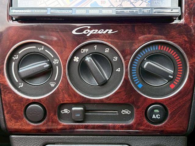 コペン アクティブトップ　ＢＢＳ１５インチアルミ／５速ＭＴ／電動オープン／ターボ／シートカバー／キーレス／ＳＤナビ／Ｂｌｕｅｔｏｏｔｈ／ＨＤＭＩ／フルセグＴＶ／ＥＴＣ／ユーザー買取車／保証書／禁煙車（18枚目）