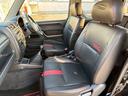ジムニー ワイルドウインド　５速ＭＴ／パートタイム４ＷＤ／ルーフレール／背面タイヤ／シートヒーター／純正１６インチアルミ／ＣＤオーディオ／ミラーウィンカー／パワステ／パワーウィンドウ／エアコン／エアバック／革巻ステアリング（7枚目）