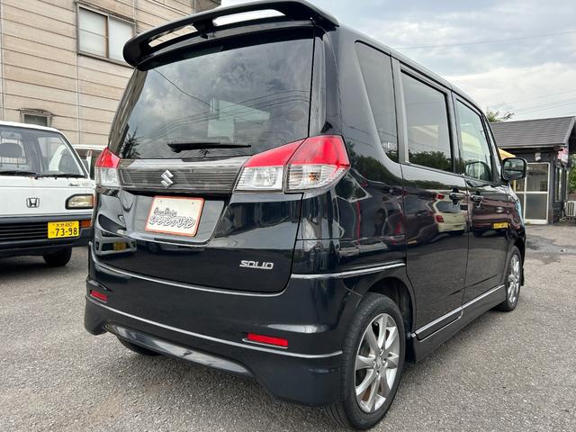 ソリオ ブラック＆ホワイト　キーフリー　プッシュスタートスマートキー　フルオートエアコン　イモビライザー　エアバック　ウォークスルー　ＡＢＳ　衝突安全ボディ　パワーステアリング　助手席エアバッグ　フルフラット　パワーウィンドウ（12枚目）