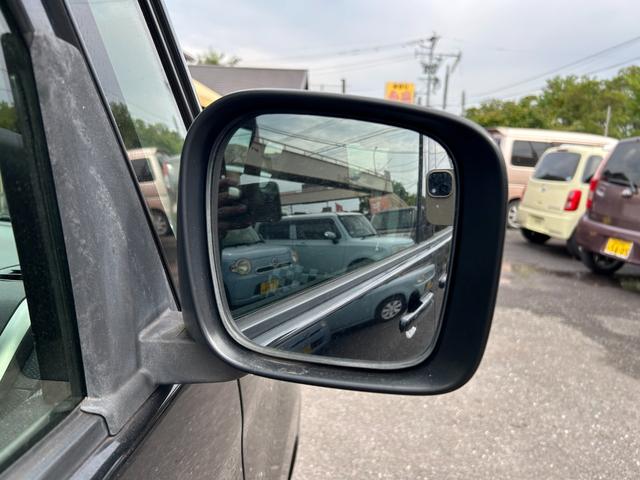 ソリオ ブラック＆ホワイト　キーフリー　プッシュスタートスマートキー　フルオートエアコン　イモビライザー　エアバック　ウォークスルー　ＡＢＳ　衝突安全ボディ　パワーステアリング　助手席エアバッグ　フルフラット　パワーウィンドウ（51枚目）