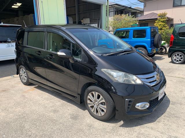フリード Ｇ　エアロ　前後ドラレコ　禁煙車　純正ナビ　バックカメラ　電動スライドドア　７人乗り　スマートキー　オートエアコン　フルセグＴＶ　ＥＴＣ　３列シート　電動格納ミラー（3枚目）