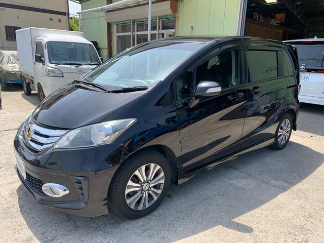 フリード Ｇ　エアロ　前後ドラレコ　禁煙車　純正ナビ　バックカメラ　電動スライドドア　７人乗り　スマートキー　オートエアコン　フルセグＴＶ　ＥＴＣ　３列シート　電動格納ミラー（4枚目）