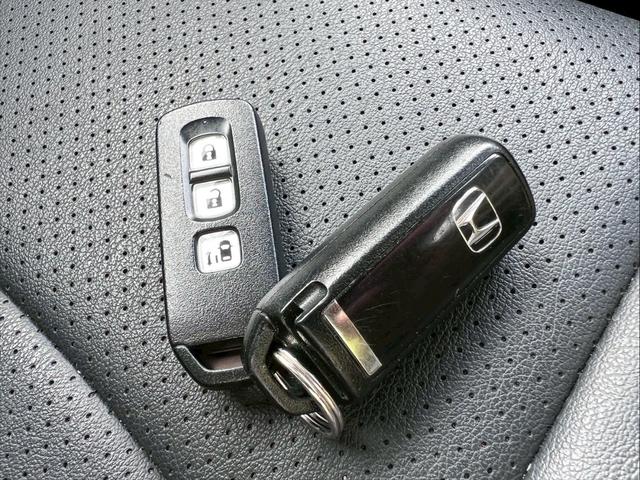 N-BOX G・Lパッケージ ナビ・TV・ETC・オートエアコン・パワースライドドア・スマートキー・アルミホイール・電動格納ミラー・ライト高調整機能・横滑り防止装置・ステアリングリモコン・プッシュスタート(11枚目)