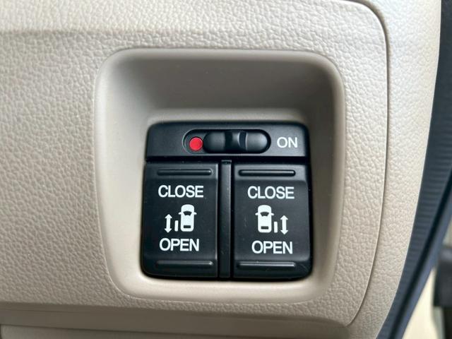 N-BOX G・Lパッケージ ディーラー整備車両・後期型・ツートンカラー・両側パワースライドドア・ビルトインETC・Bluetoothオーディオ・アルミホイール・ナビ・フルセグTV・アイドリングストップ・シートカバー(5枚目)