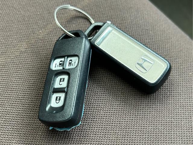 N-BOX G・Lパッケージ ディーラー整備車両・後期型・ツートンカラー・両側パワースライドドア・ビルトインETC・Bluetoothオーディオ・アルミホイール・ナビ・フルセグTV・アイドリングストップ・シートカバー(14枚目)