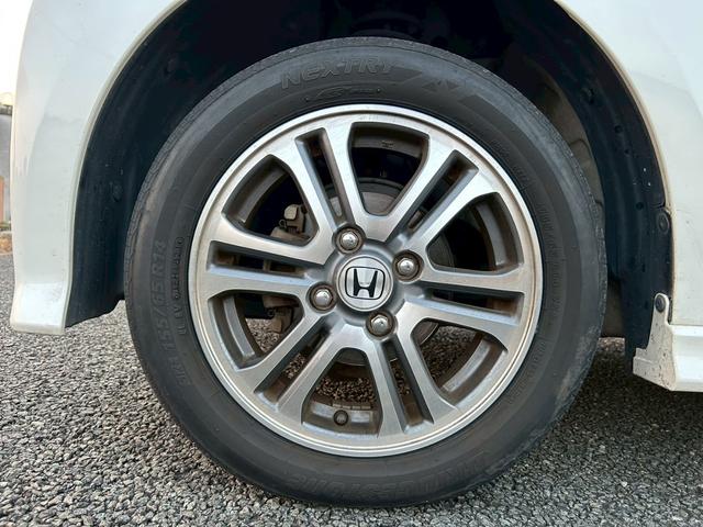 Ｎ－ＢＯＸカスタム Ｇ・Ｌパッケージ　ＥＴＣ・ナビ・フルセグＴＶ・左側パワースライドドア・右側イージークローザー・プッシュスタート・スマートキー・アルミホイール・オートヘッドライト（10枚目）