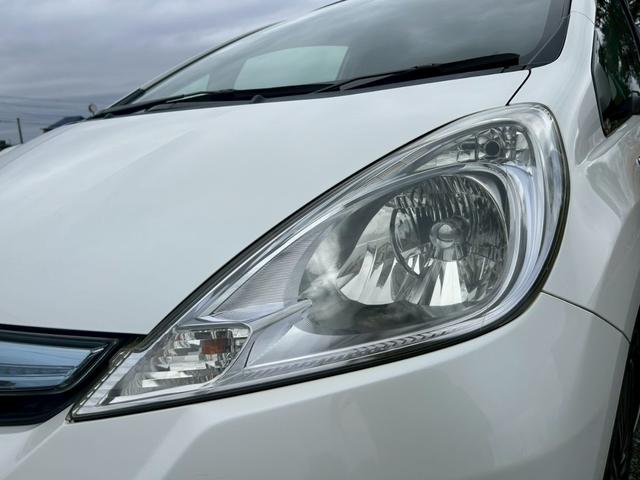 フィットハイブリッド スマートセレクション　ファインスタイル　クルーズコントロール・ビルトインＥＴＣ・運転席＆助手席シートヒーター・アルミホイール・オーディオ・横滑り防止装置・盗難防止装置・スマートキー・ＭＴモード・ＡＢＳ・電動格納ミラー（14枚目）