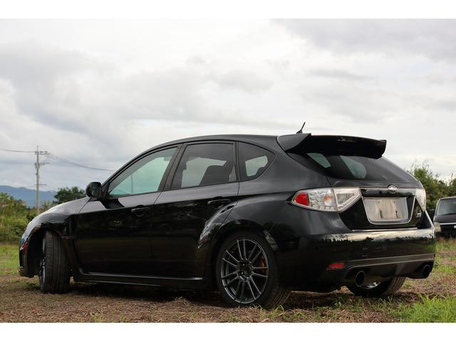 インプレッサ ＷＲＸ　ＳＴｉ　アペックスマフラー　スピリット車高調　スペックＣ用純正１８インチアルミホイール　６速マニュアル　ＤＣＣＤ　ＳＩドライブ　スマートキー　オートエアコン　ハーフレザーシート　スパルコステアリング（3枚目）