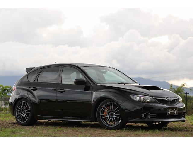 インプレッサ ＷＲＸ　ＳＴｉ　アペックスマフラー　スピリット車高調　スペックＣ用純正１８インチアルミホイール　６速マニュアル　ＤＣＣＤ　ＳＩドライブ　スマートキー　オートエアコン　ハーフレザーシート　スパルコステアリング（8枚目）