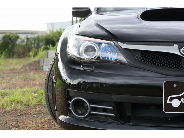 インプレッサ ＷＲＸ　ＳＴｉ　アペックスマフラー　スピリット車高調　スペックＣ用純正１８インチアルミホイール　６速マニュアル　ＤＣＣＤ　ＳＩドライブ　スマートキー　オートエアコン　ハーフレザーシート　スパルコステアリング（10枚目）