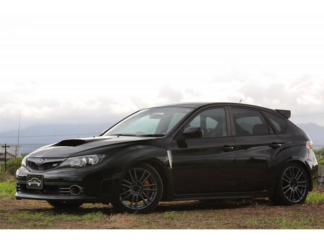 インプレッサ ＷＲＸ　ＳＴｉ　アペックスマフラー　スピリット車高調　スペックＣ用純正１８インチアルミホイール　６速マニュアル　ＤＣＣＤ　ＳＩドライブ　スマートキー　オートエアコン　ハーフレザーシート　スパルコステアリング（34枚目）