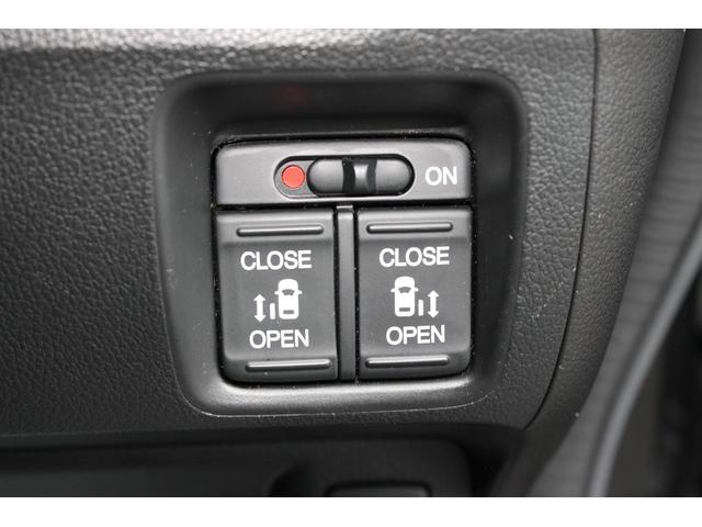 Ｎ－ＢＯＸカスタム Ｇ・ターボＬパッケージ　無限マフラー・社外ナビ・バックカメラ・Ｂｌｕｅｔｏｏｔｈ・ＣＤ・両側電動スライドドア・無限マフラー・ハーフレザーシート・ＨＩＤヘッドライト・ターボ・（7枚目）