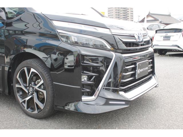 ヴォクシー ハイブリッドＺＳ　煌ＩＩＩ　ＴＲＤエアロ・純正１０インチナビ・１２．１フリップダウンモニター・ＨＤＭＩ対応・規格外トヨタ純正アルミ・両側電動スライドドア・ドライブレコーダー・セーフティセンス・ビルトインＥＴＣ・バックカメラ・（21枚目）