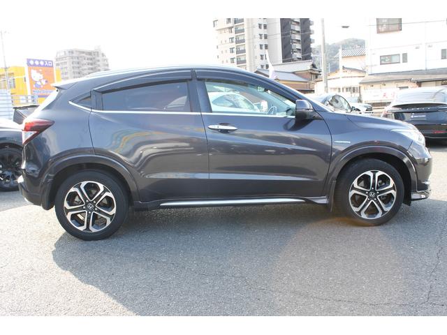 ヴェゼル ハイブリッドＺ　純正エアロ・ＯＰブラウンインテリア・純正８インチナビ・バックカメラ・ＣＤ／ＤＶＤ再生・Ｂｌｕｅｔｏｏｔｈ・シティブレーキアクティブ・専用アルミホイール・ハーフレザーシート・スマートキー・ＬＥＤヘッドラ（14枚目）