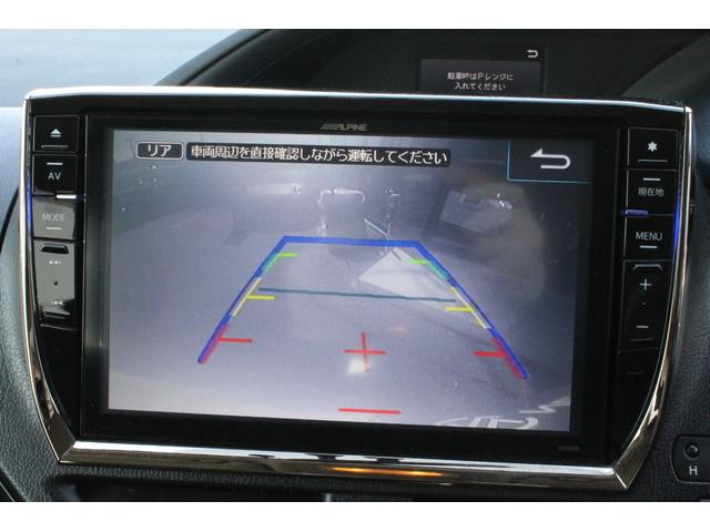 ヴォクシー ハイブリッドＶ　アルパイン１０インチナビ・フリップダウンモニター・ＣＤ／ＤＶＤ・両側電動スライドドア・ＬＥＤヘッドライト・純正アルミホイール・前席シートヒーター・バックカメラ・スマートキー・ＥＴＣ（5枚目）