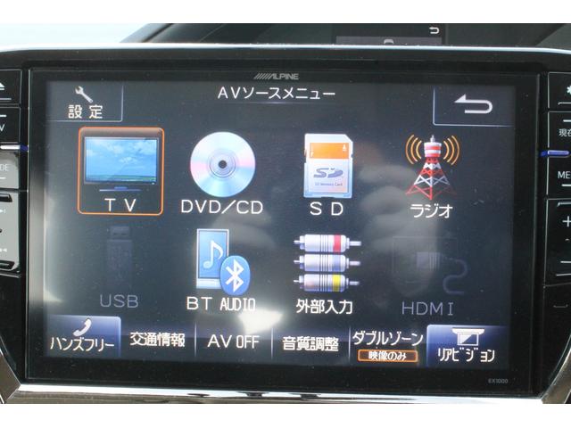 ヴォクシー ハイブリッドＶ　アルパイン１０インチナビ・フリップダウンモニター・ＣＤ／ＤＶＤ・両側電動スライドドア・ＬＥＤヘッドライト・純正アルミホイール・前席シートヒーター・バックカメラ・スマートキー・ＥＴＣ（7枚目）