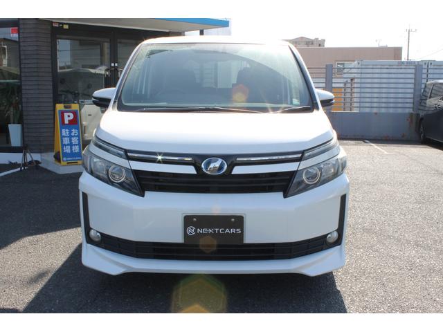 ヴォクシー ハイブリッドＶ　アルパイン１０インチナビ・フリップダウンモニター・ＣＤ／ＤＶＤ・両側電動スライドドア・ＬＥＤヘッドライト・純正アルミホイール・前席シートヒーター・バックカメラ・スマートキー・ＥＴＣ（16枚目）