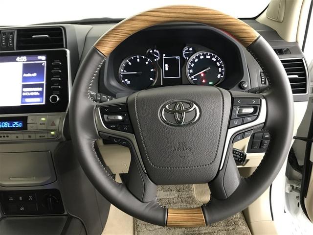 �h���C�o�[�Ɋ��Y�����K�ȑ���t�B�[���������炷�X�e�A�����O�ł��B