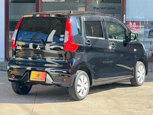 eKワゴン M キーレスエントリー アイドリングストップ 電動格納ミラー シートヒーター ベンチシート CVT ABS CD 衝突安全ボディ エアコン パワーステアリング パワーウィンドウ 運転席エアバッグ(2枚目)