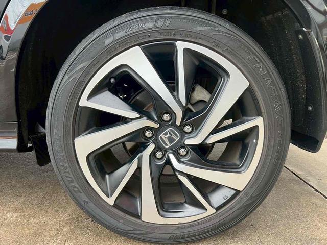 ヴェゼル ハイブリッドRS・ホンダセンシング 車検令和9年9月/純正8インチナビ/バックカメラ/フルセグTV/電動パーキングブレーキ/オートブレーキホールド/クルーズコントロール/パドルシフト/ステアリングスイッチ/純正18インチアルミ/禁煙(34枚目)