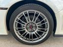 WRX STI Aライン プレミアムPkg(タンカラーSTIロゴ革バケットシート/パワーシート/シートヒーター/タンカラーブラックコンビステアリング/BBS製ブラックハイラスター塗装18インチアルミホイール)ブラックキャリパー(31枚目)
