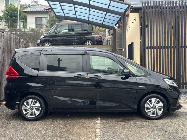 フリードハイブリッド 後期型 純正ナビ フルセグ バックカメラ 両側電動スライド ETC LEDヘッド 6人乗 衝突軽減ブレーキ レーダークルーズ 車検整備済 R9年11月 ブリヂストン2024年製タイヤ装着 禁煙(18枚目)