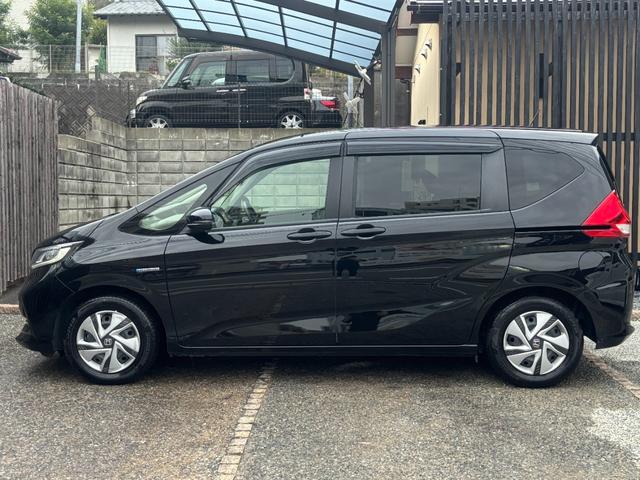 フリードハイブリッド 後期型 純正ナビ フルセグ バックカメラ 両側電動スライド ETC LEDヘッド 6人乗 衝突軽減ブレーキ レーダークルーズ 車検整備済 R9年11月 ブリヂストン2024年製タイヤ装着 禁煙(19枚目)