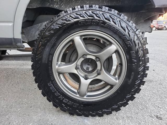 ジムニー ＸＧ　リフトアップ　社外１６インチアルミホイール　ブロックタイヤ　スペアタイヤ　社外バンパー　ＬＥＤテールランプ　シートカバー　ＥＴＣ（24枚目）