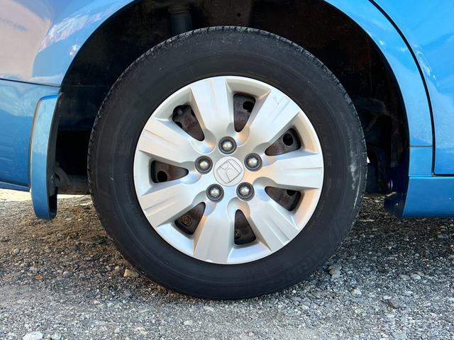 ステップワゴン G HDDナビ スマートスタイルエディション ETC バックカメラ 純正15インチアルミホイール スマートキー ステアリングリモコン 両側電動スライドドア オートライト オートエアコン フルセグテレビ DVD 電動格納ミラー ウインカーミラー(17枚目)