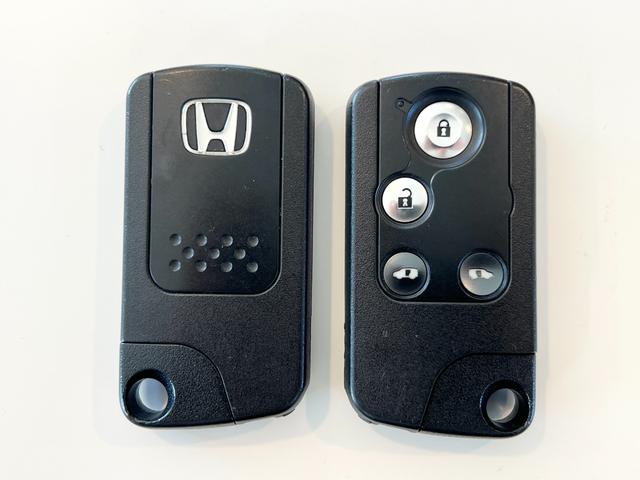 ステップワゴン G HDDナビ スマートスタイルエディション ETC バックカメラ 純正15インチアルミホイール スマートキー ステアリングリモコン 両側電動スライドドア オートライト オートエアコン フルセグテレビ DVD 電動格納ミラー ウインカーミラー(29枚目)