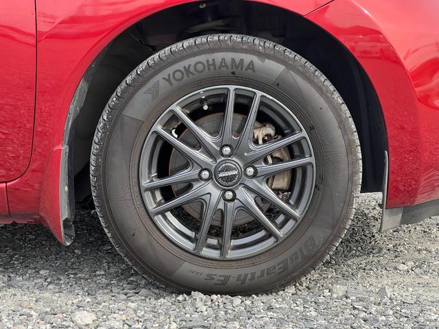 ノート Ｘ　ＤＩＧ－Ｓ　ＥＴＣ　バックカメラ　社外１４インチアルミホイール　プッシュスタート　スマートキー　オートエアコン　レベライザー４段階　スペアタイヤ　取扱説明書　電動格納ミラー（15枚目）