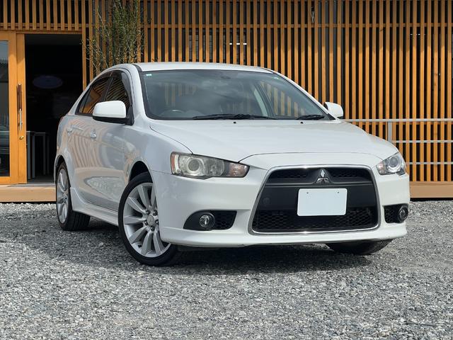 ギャランフォルティススポーツバック スポーツ バックカメラ MTモード パドルシフト 純正18インチアルミホイール キーレス ステアリモコン オートエアコン HIDヘッドライト 純正ナビ スペアキー 取扱説明書 フォグライト CD・DVD再生(2枚目)