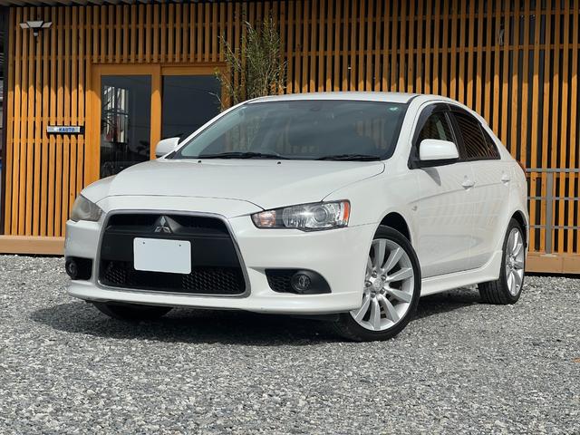 ギャランフォルティススポーツバック スポーツ バックカメラ MTモード パドルシフト 純正18インチアルミホイール キーレス ステアリモコン オートエアコン HIDヘッドライト 純正ナビ スペアキー 取扱説明書 フォグライト CD・DVD再生(6枚目)