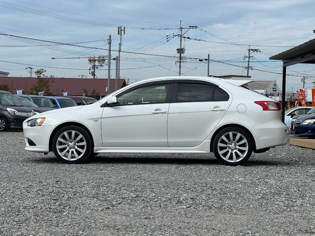 ギャランフォルティススポーツバック スポーツ バックカメラ MTモード パドルシフト 純正18インチアルミホイール キーレス ステアリモコン オートエアコン HIDヘッドライト 純正ナビ スペアキー 取扱説明書 フォグライト CD・DVD再生(7枚目)