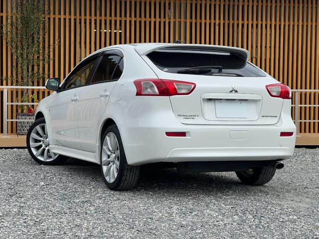 ギャランフォルティススポーツバック スポーツ バックカメラ MTモード パドルシフト 純正18インチアルミホイール キーレス ステアリモコン オートエアコン HIDヘッドライト 純正ナビ スペアキー 取扱説明書 フォグライト CD・DVD再生(8枚目)